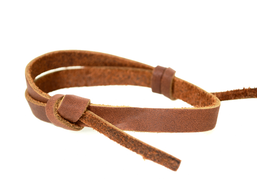 Saddle brown narrow leather wrist band with adjustable slip knot closure